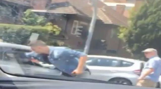 An assault, where a passenger got out of a car to punch a motorist in the face in Melbourne, has been filmed by a witness. Picture: Victoria Police