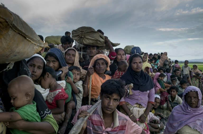 Rohingya refugees crossing from Myanmar into Bangladesh on October 9, 2017