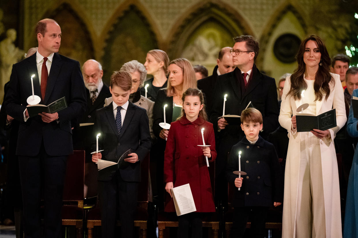 kate middleton in white coat and white pants, kate middleton, prince louis, princess charlotte, prince george, prince william, The royal family pictured at the Together At Christmas service at Westminster Abbey in London. (Aaron Chown/PA Wire)