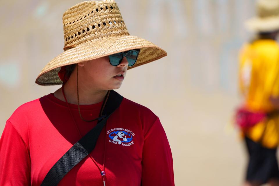 Lifeguard Sarah Pi–a looks after the kids in the shallow end at Harmon Pool on June 15, 2023, in Phoenix.