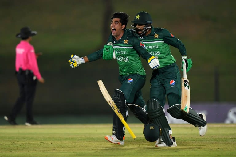 Winning moment: Pakistan's Naseem Shah and Haris Rauf (right) celebrate victory (Ishara S. KODIKARA)