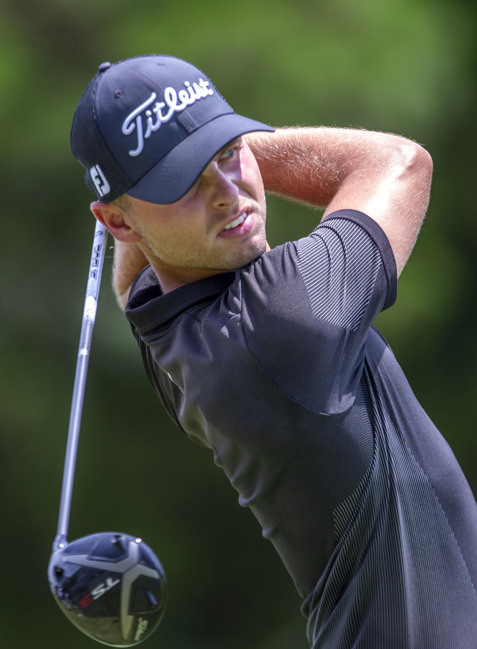 Aam Svensson follows his tee shot on the 18th hole during the second round of the Wyndham Championship golf tournament at Sedgefield Country Club in Greensboro, N.C., Friday, Aug. 2, 2019. (H. Scott Hoffmann/News & Record via AP)