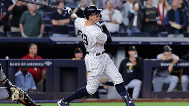 PHOTO: New York Yankees' Aaron Judge follows through on his 60th home run of the season, during the ninth inning of the team's baseball game against the Pittsburgh Pirates on Tuesday, Sept. 20, 2022, in New York. (Jessie Alcheh/AP)