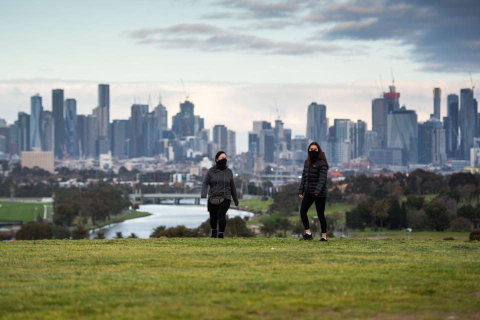 MELBOURNE, Sept. 1, 2020 -- People take a walk in Melbourne, Victoria, Australia, Aug. 31, 2020.   A lockdown in the Australian state of Victoria aimed at stopping a COVID-19 outbreak came under scrutiny on Monday, with critics calling for a clearer plan to end the restrictions which are said to be weighing on the nation's economic recovery.     Victoria recorded 73 new infections on Monday following a month of Stage 4 lockdowns in capital city Melbourne, down from a peak of over 700 in early August.  (Photo by Bai Xue/Xinhua via Getty) (Xinhua/Bai Xue via Getty Images)