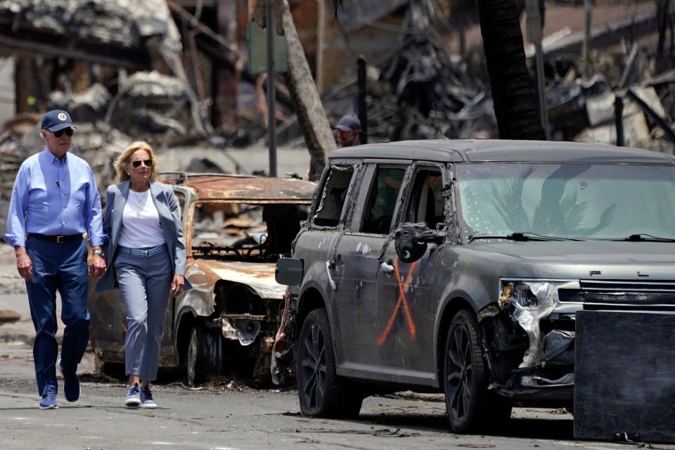 President Joe Biden and first lady Jill Biden tour areas devastated by the Maui wildfires, Monday, Aug. 21, 2023, in Lahaina, Hawaii.