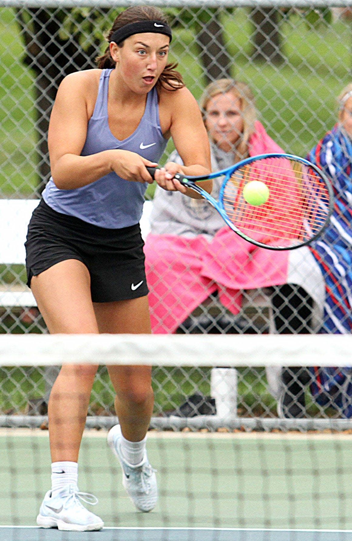 Megan Fannin returns a shot against Mitchell’s Avery Larson during championship semifinals action at No. 1 singles in the 2018 Eastern South Dakota Conference girls tennis tournament at Brookings.