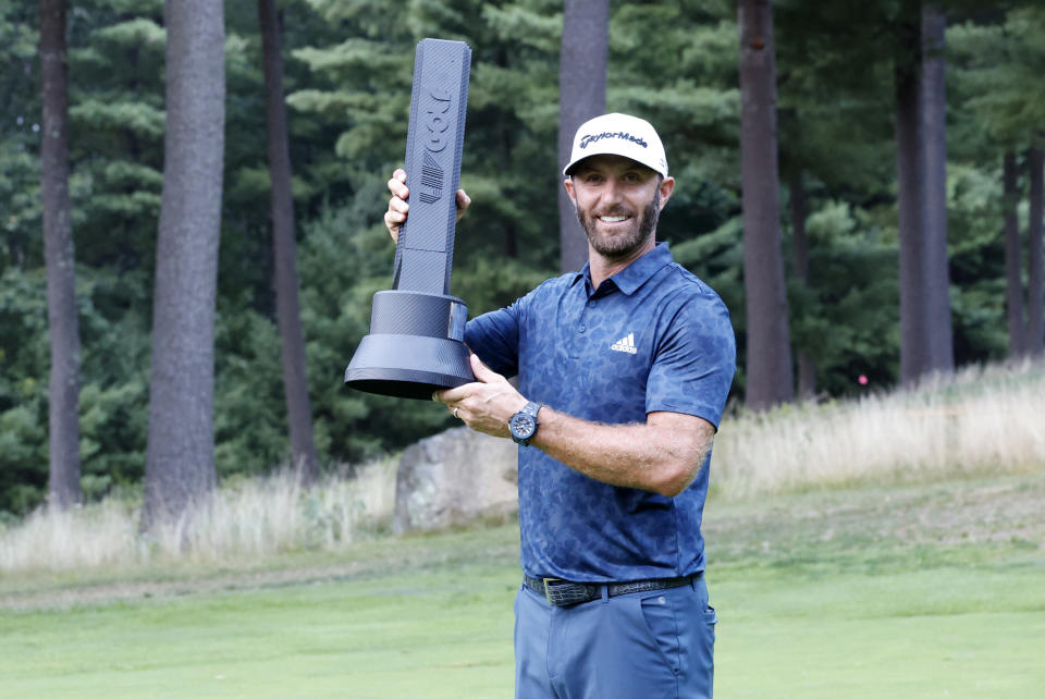 Dustin Johnson, pictured here with the trophy after winning the LIV Golf Invitational Series Boston.