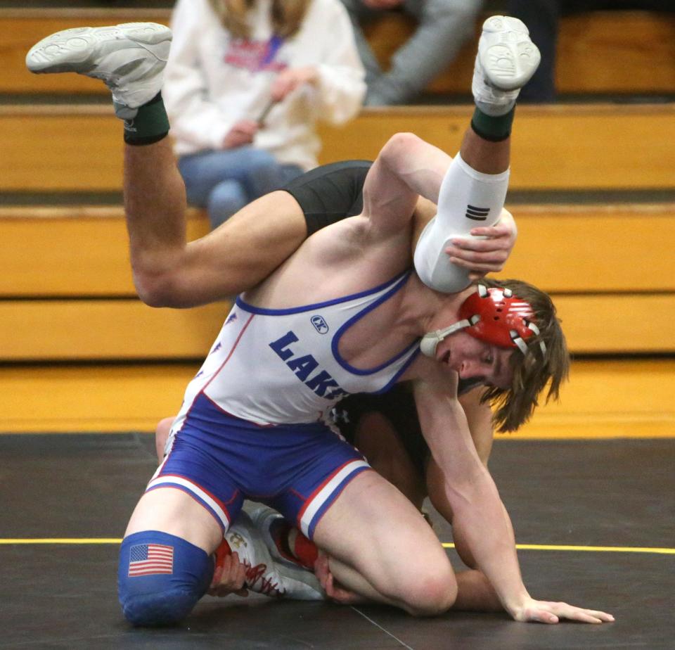 Josh Jordan, bottom, of Lake defeaded Skylar Ristoff, top, of Perry in a 150-pound bout at Perry on Thursday, Jan. 20, 2022.