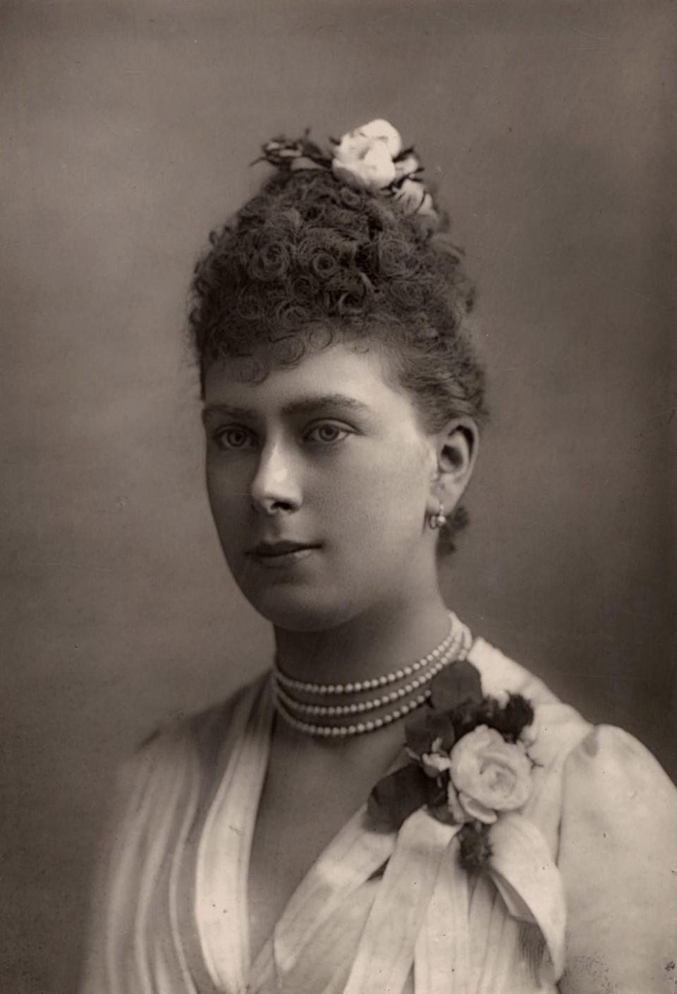 <p>While their engagement was announced in the garden of Sheen Lodge in 1893, the details of Queen Mary's engagement ring remains unknown. Historians have been unable to find a record of or track down a ring belonging to the Queen, who reigned from 1910 until 1936, and it's <a href="https://www.thehistorypress.co.uk/articles/royal-engagement-rings-through-the-centuries/" rel="nofollow noopener" target="_blank" data-ylk="slk:referred to as the lost ring;elm:context_link;itc:0;sec:content-canvas" class="link ">referred to as the lost ring</a>. The Queen did, however, leave behind the Queen Mary Bandeau Tiara, which she wore on her wedding day and was lent to the Duchess of Sussex on her wedding day in 2018. </p>