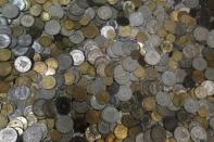 Old Lebanese coins, withdrawn from circulation, are displayed at the currency museum of Lebanon's Central Bank in Beirut November 6, 2014. REUTERS/Jamal Saidi