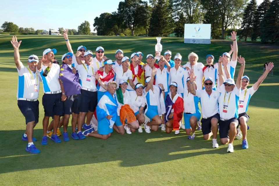 Team Europe poses after they defeated the United States at the Solheim Cup golf tournament (Carlos Osorio/AP) (AP)