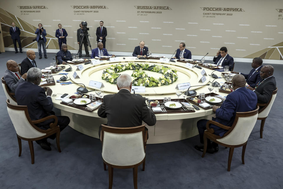 Russian President Vladimir Putin, rear center, hosts a breakfast meeting with leaders of African regional organisations on the sideline of the Russia Africa Summit in St. Petersburg, Russia, Thursday, July 27, 2023. (Mikhail Metzel/TASS Host Photo Agency Pool Photo via AP)