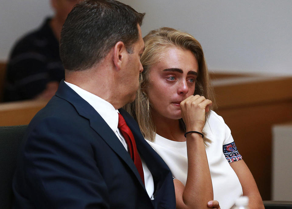 Michelle Carter awaits her sentencing in a courtroom in Taunton, Mass., Aug. 3, 2017, for involuntary manslaughter for encouraging Conrad Roy III to kill himself in July 2014. / Credit: Matt West/The Boston Herald via AP