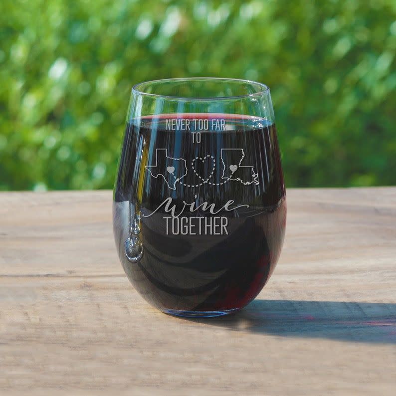 <p>etsy.com</p><p><strong>$10.95</strong></p><p>'Never too far to wine together' reads this beautifully engraved wine tumbler. Get one for her and one for yourself so you can enjoy a glass together—just like old times!</p>