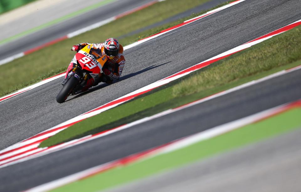 Honda MotoGP rider Marc Marquez of Spain takes a curve during the third free practice session of the San Marino Grand Prix in Misano circuit in central Italy, September 14, 2013. (REUTERS/Max Rossi)