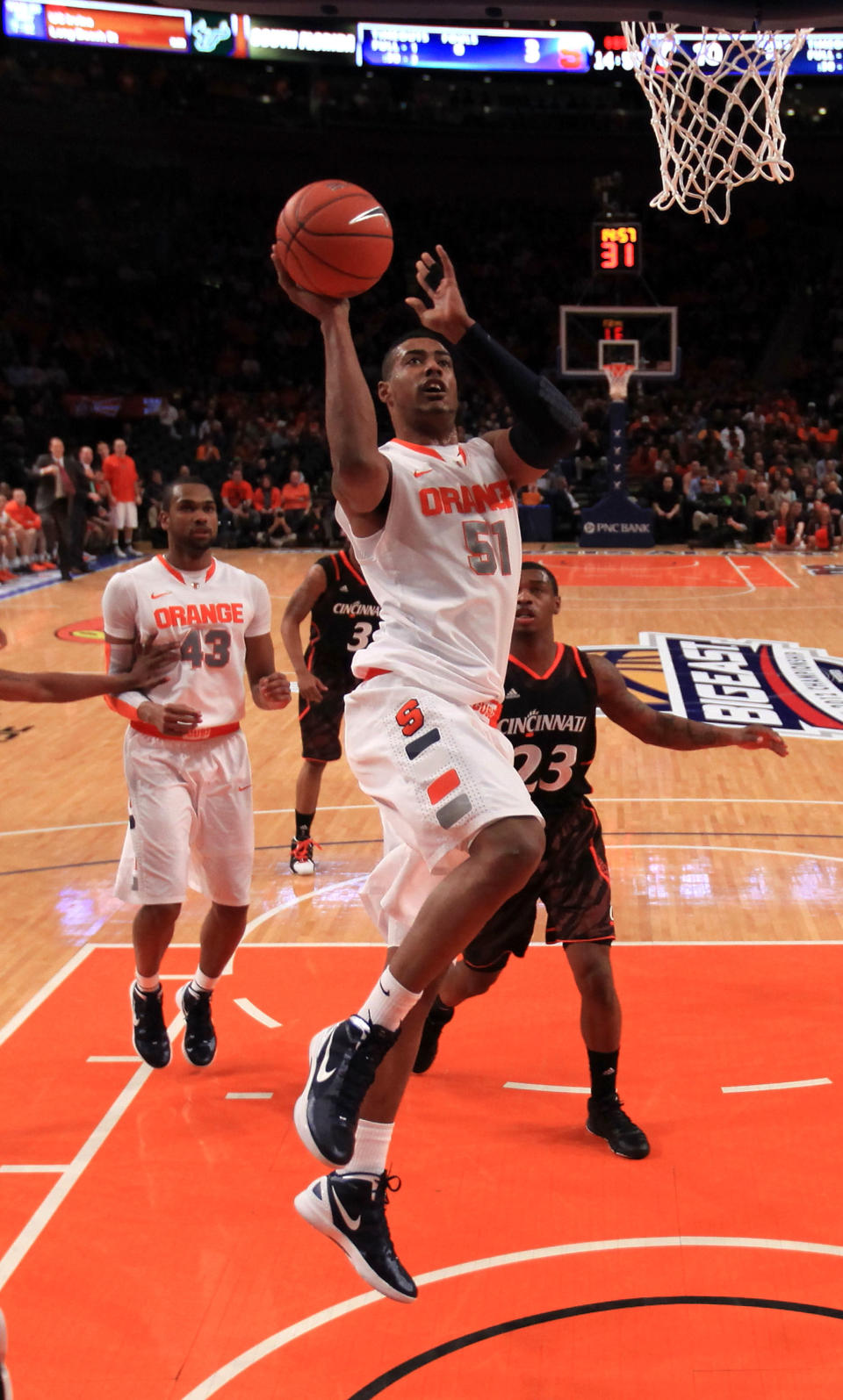 NEW YORK, NY - MARCH 09: Fab Melo #51 of the Syracuse Orange drives to the basket against the Cincinnati Bearcats during the semifinals of the Big East men's basketball tournament at Madison Square Garden on March 9, 2012 in New York City. (Photo by Chris Trotman/Getty Images)