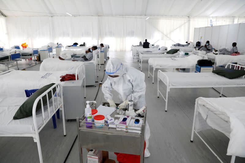 FILE PHOTO: A nurse works inside a field hospital builtÊon a soccer stadium in Machakos