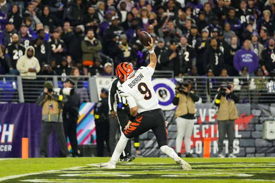 Cincinnati Bengals quarterback Joe Burrow reacts after scoring a touchdown during the second half of an NFL football game against the Baltimore Ravens, Sunday, Oct. 9, 2022, in Baltimore. (AP Photo/Julio Cortez)