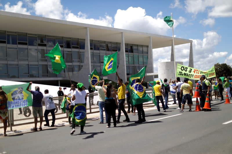 Supporters of far-right Brazilian President Jair Bolsonaro protest against the recommendations for social isolation of the governor of Brasilia during the coronavirus disease (COVID-19) outbreak, in Brasilia