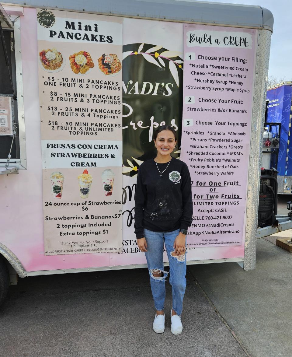 Nadi Altamirano of Nadi's Crepes shows off her comprehensive menu board of crepes and mini pancakes at the Hesperia Community Farmers Market.