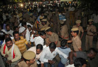 Police stop well wishers of Tamil Nadu Chief Minister Jayalalithaa Jayaraman after they gather outside a hospital where Jayalalithaa is being treated in Chennai, India, December 4, 2016. REUTERS/Stringer