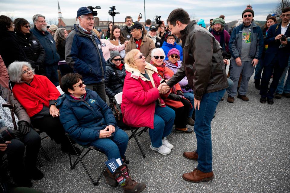 Democratic presidential hopeful Pete Buttigieg speaks with supporters prior to a canvassing Kick-Off in Claremont, NH, on Nov. 10, 2019.