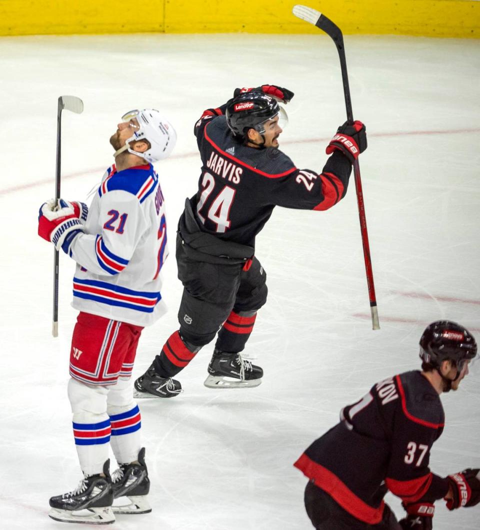 Carolina Hurricanes center Seth Jarvis (24) celebrates after the game winning goal by Brady Skjei in the third period to secure a 4-3 victory over the New York Rangers during Game 4 in the second round of the 2024 Stanley Cup playoffs on Saturday, May 11, 2024 at PNC Arena, in Raleigh N.C.