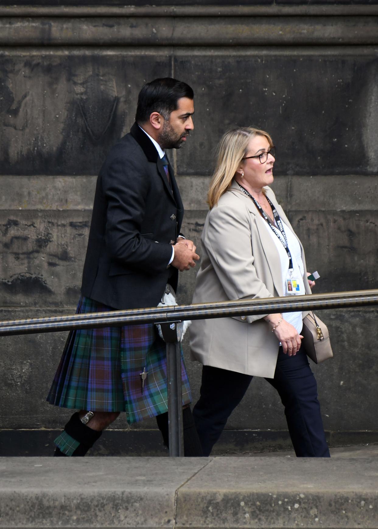 First minister of Scotland Humza Yousaf (L) arrives ahead of the National Service of Thanksgiving and Dedication (Getty Images)