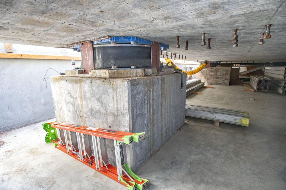 A look at a seismic isolator, beneath the main pad.