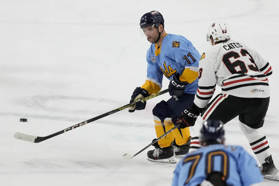 Milwaukee Admirals' Cody Hodgson skates during an American Hockey League game Friday, March 1, 2024, in Milwaukee. Hodgson is a former NHL player who retired from hockey eight years ago due to a muscle disorder but is now making a comeback. (AP Photo/Morry Gash)