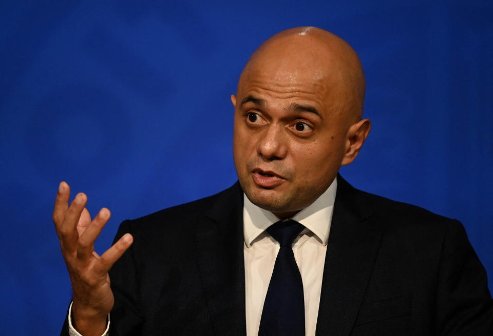 Britain&#39;s Health Secretary Sajid Javid speaks during a press conference inside the Downing Street Briefing Room in central London on October 20, 2021. - Britain&#39;s Health Secretary Sajid Javid on Wednesday rejected calls to trigger 