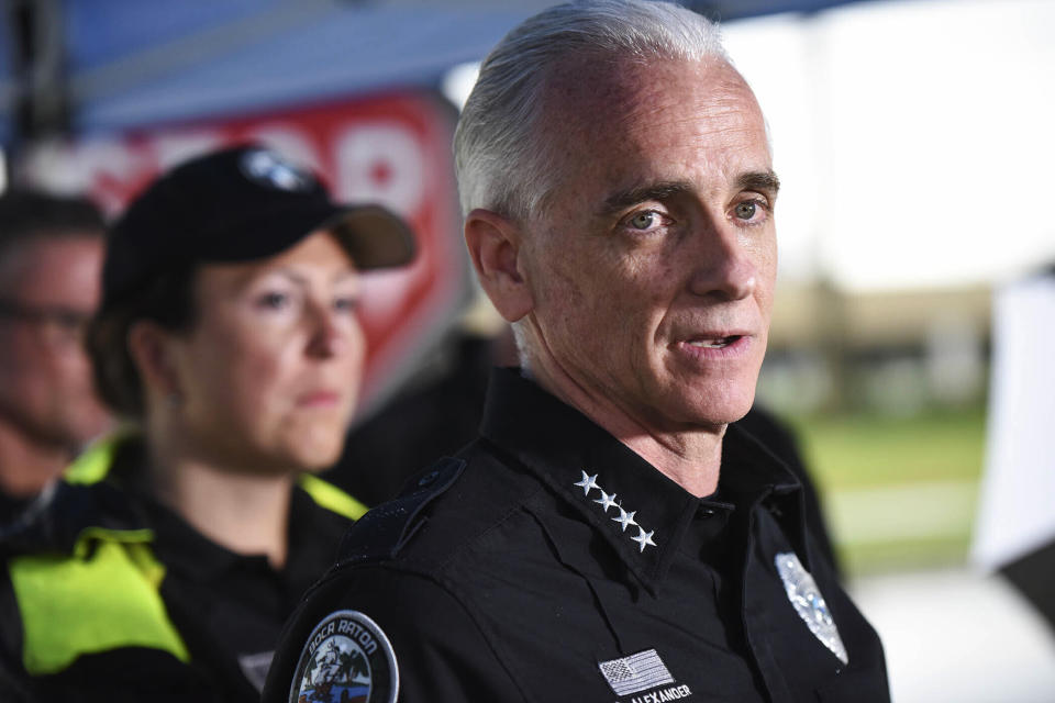 Boca Raton Police Chief Dan Alexander addresses the media outside Town Center at Boca Raton, Sunday, Oct. 13, 2019, in Boca Raton, Fla. The mall had been placed on lockdown following reports of shots fired. (Andres Leiva/Palm Beach Post via AP)