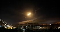 <p>Syrian air defense missiles are seen in the sky over the capital Damascus, Syria, 10 May 2018. According to Syrian official media reports, the air defense was responding to a new wave of Israeli missile strikes. (Photo: Youssef Badawi/EPA-EFE/REX/Shutterstock) </p>