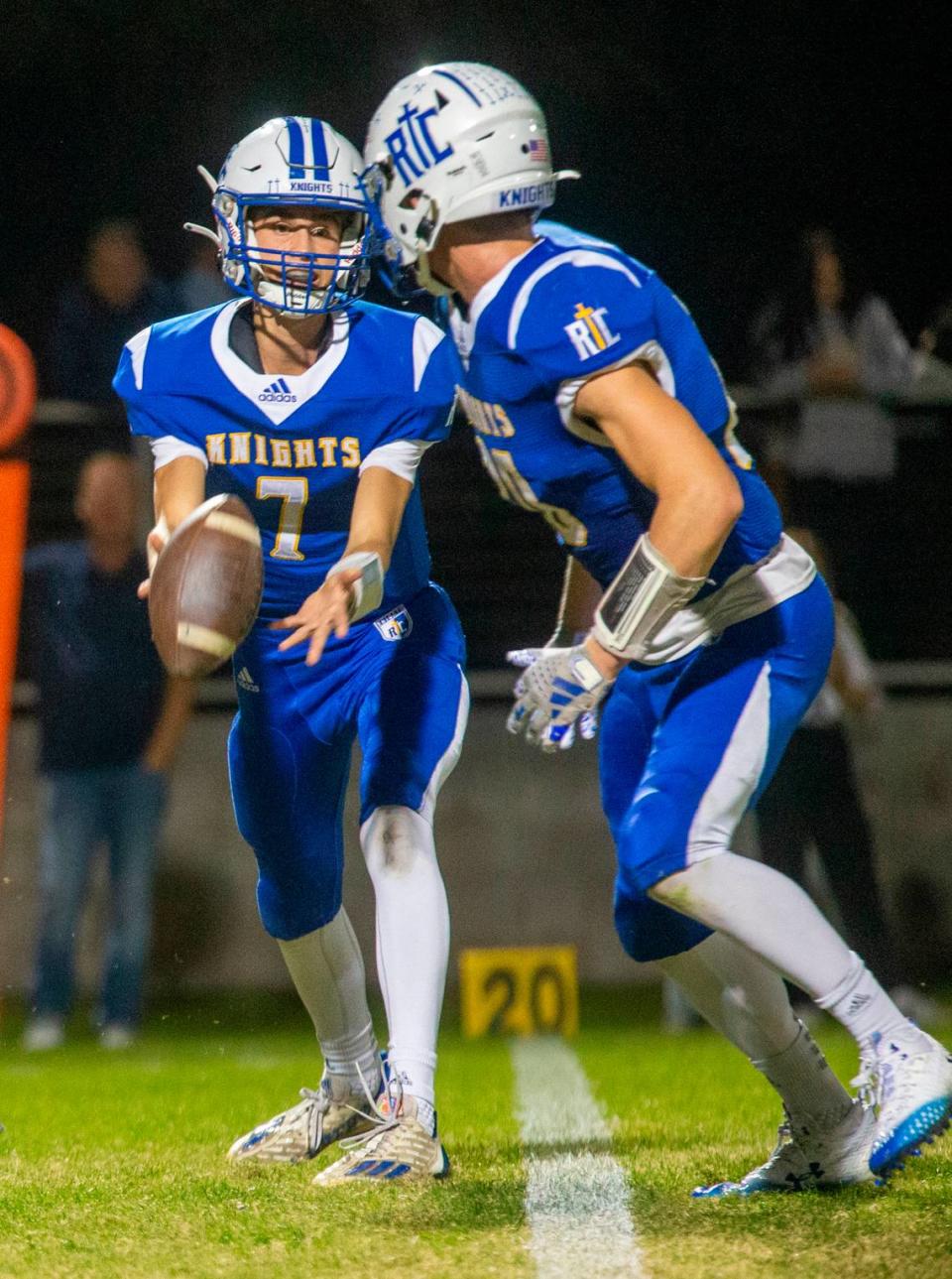 Mason Tameling, 7, of Ripon Christian, tosses the ball to Trevor Van elderen, 20, as they work their way upfield against Golden Sierra Friday Nov. 03, 2023 at Ripon Christian.