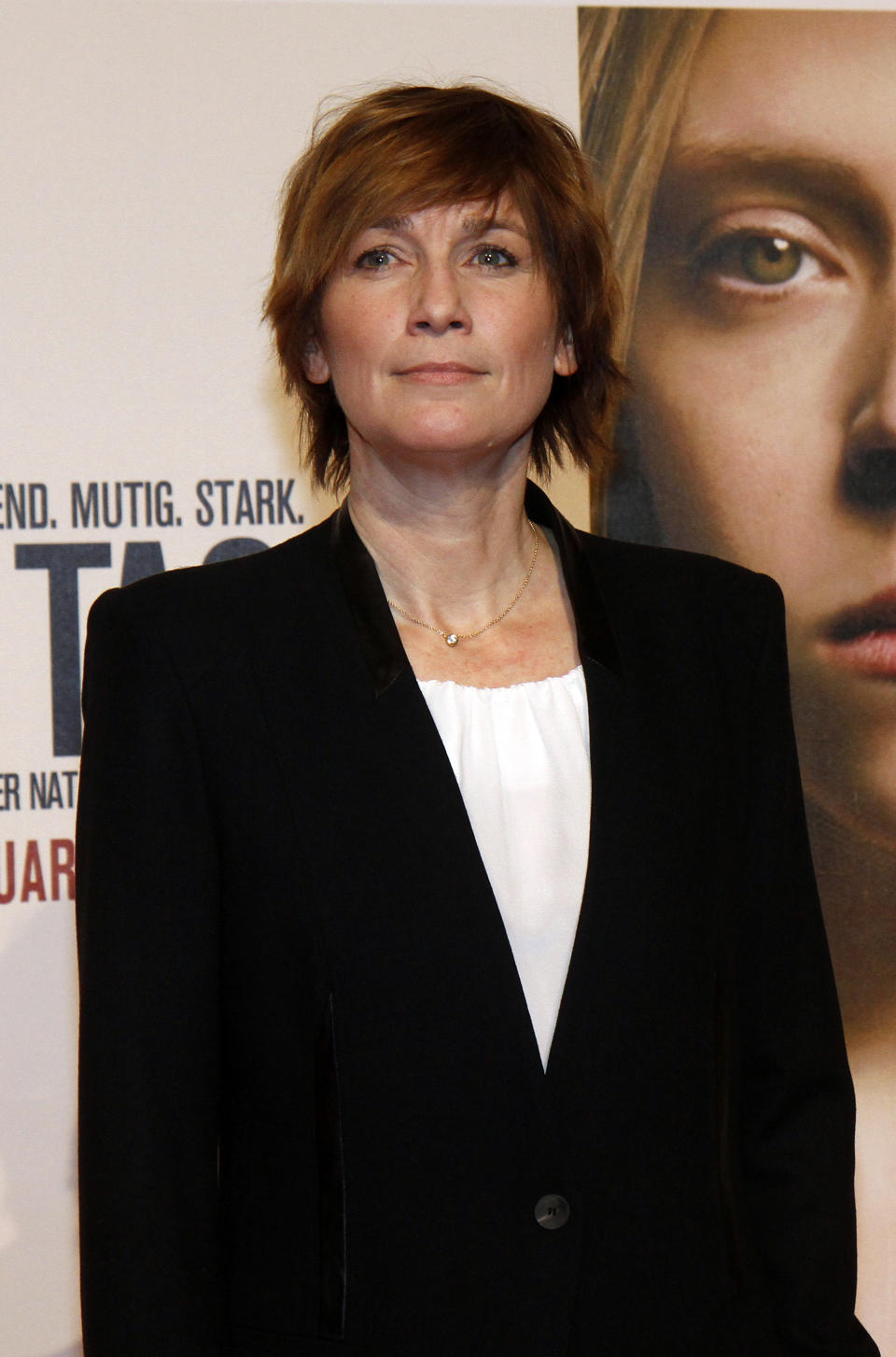 Director Sherry Hormann poses for photographers before the premiere of the film "3096 Days" in Vienna, Austria, Monday Feb. 25, 2013. The film tells the story of Natascha Kampusch who was abducted as a schoolgirl and held prisoner in a cellar for almost nine years. (AP Photo/Ronald Zak)