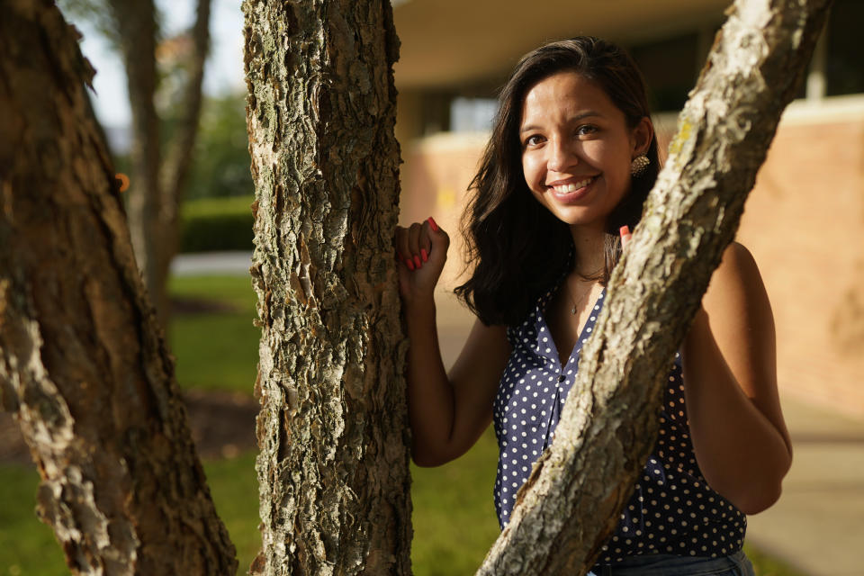 Megan Foster poses for a picture on the campus of the University of North Carolina-Charlotte on Saturday, Aug. 1, 2020, in Charlotte, N.C. The iconic summer job for high school and college students has been on the wane for nearly 20 years. But the pandemic is squeezing even more young people out of the workforce. Foster, a grad student, was unable to get a paid internship or summer job in her field of communications. (AP Photo/Chris Carlson)