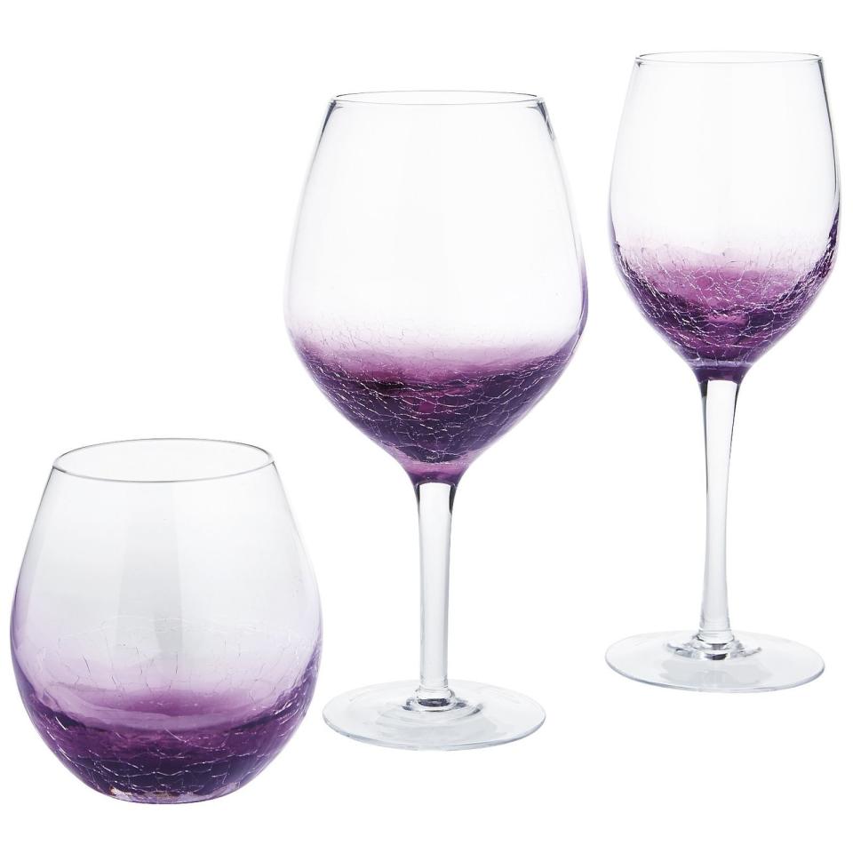 Get the purple stemware <a href="https://www.pier1.com/crackle-purple-stemware/PS34115.html" target="_blank">here</a>.