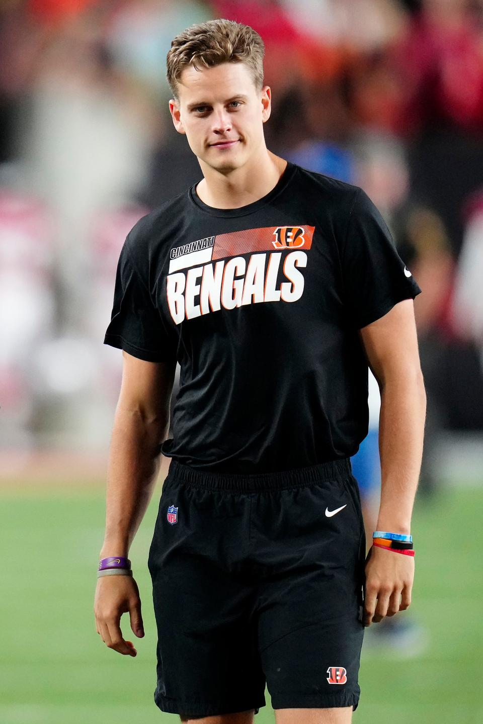 Aug 12, 2022; Cincinnati, Ohio, USA;  Cincinnati Bengals quarterback Joe Burrow (9) walks for the locker room after the fourth quarter of the NFL Preseason Week One game between the Cincinnati Bengals and Arizona Cardinals at Paycor Stadium. The Cardinals won, 36-23. (Mandatory Credit: Sam Greene-USA TODAY Sports)