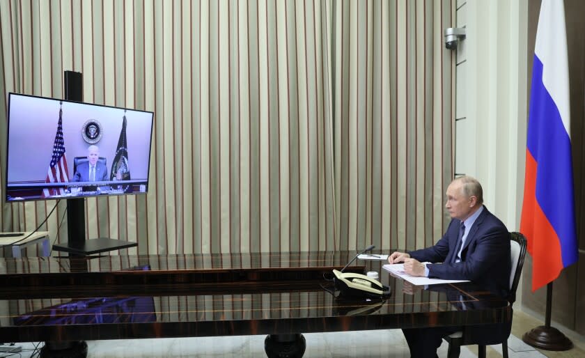 Russian President Vladimir Putin during his talks with U.S. President Joe Biden in the Bocharov Ruchei residence in the Black Sea resort of Sochi, Russia, Tuesday, Dec. 7, 2021. The video call between U.S. President Joe Biden and Russian President Vladimir Putin, during which the two leaders are expected to discuss tensions over Ukraine. (Sputnik, Kremlin Pool Photo via AP)