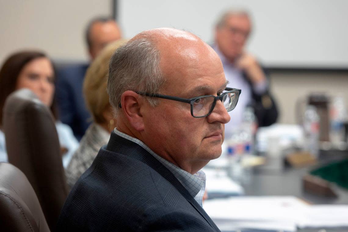 After hearing dozens of people demand his resignation, Tarrant Appraisal District Chief Appraiser Jeff Law listens to another public comment on Thursday, June 30, 2022, in Fort Worth, Texas.