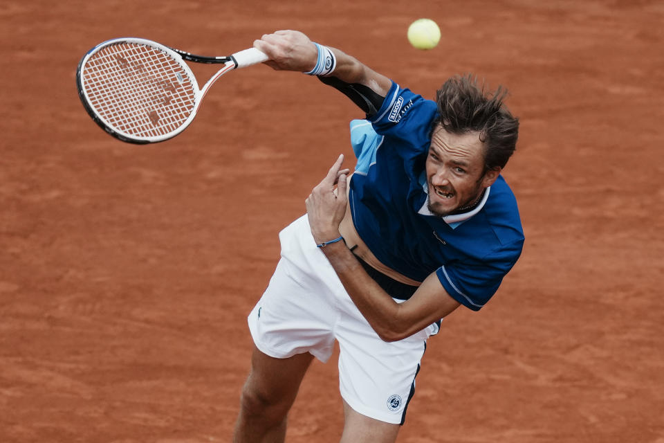 Russia's Daniil Medvedev serves against Serbia's Miomir Kecmanovic during their third round match at the French Open tennis tournament in Roland Garros stadium in Paris, France, Saturday, May 28, 2022. (AP Photo/Thibault Camus)