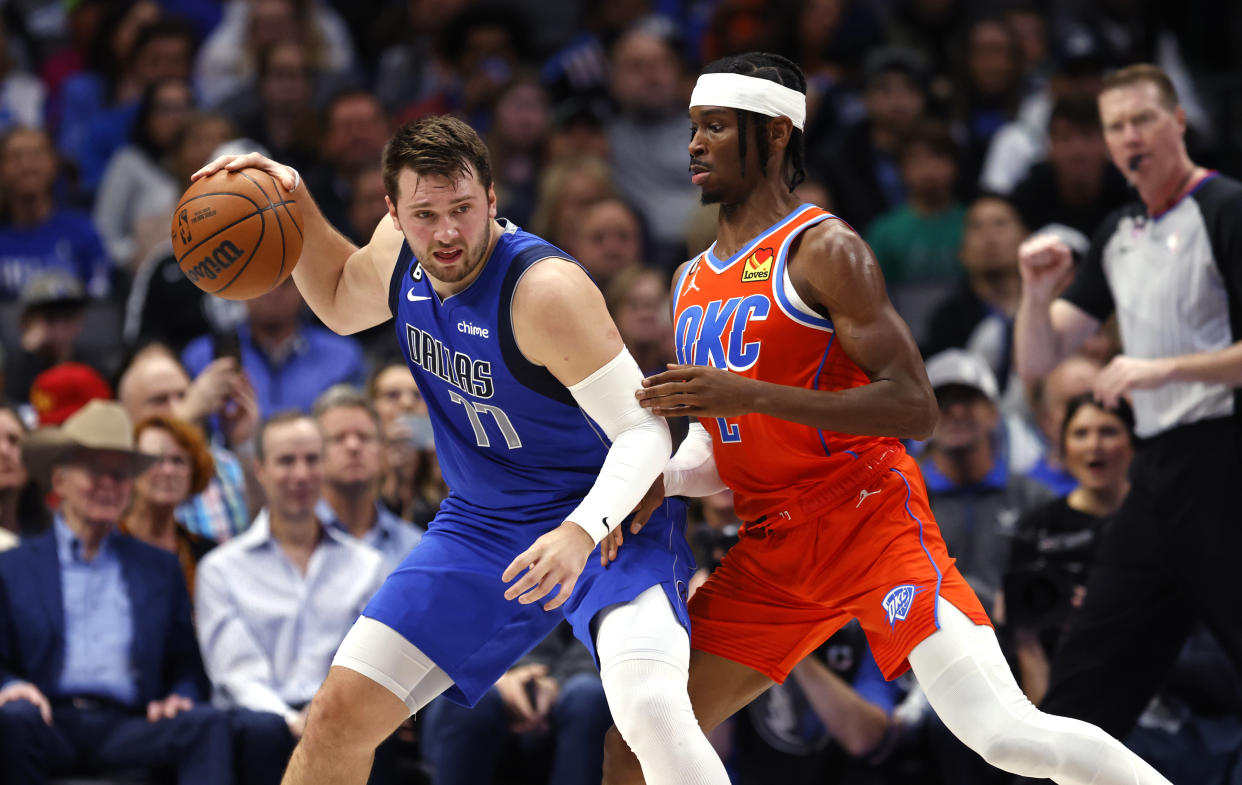 Luka Doncic and Shai Gilgeous-Alexander headline a loaded point guard group for this fantasy hoops season. (Photo by Ron Jenkins/Getty Images)