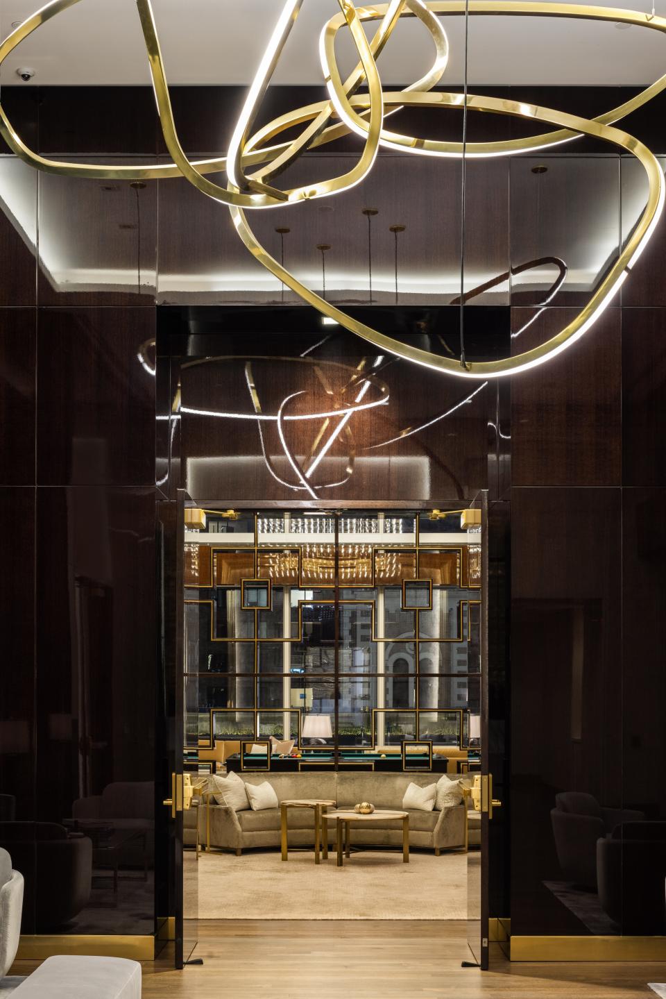 a light fixture and seating area on the 14th floor of luxury skyscraper Central Park Tower