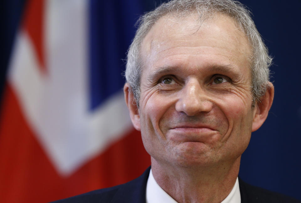 British minister for Europe David Lidington smiles during a meeting with the press, after meeting with Lithuania's Foreign Minister Linas Linkevicius  in Vilnius, Lithuania, Tuesday, March 25, 2014.  (AP Photo/Mindaugas Kulbis)