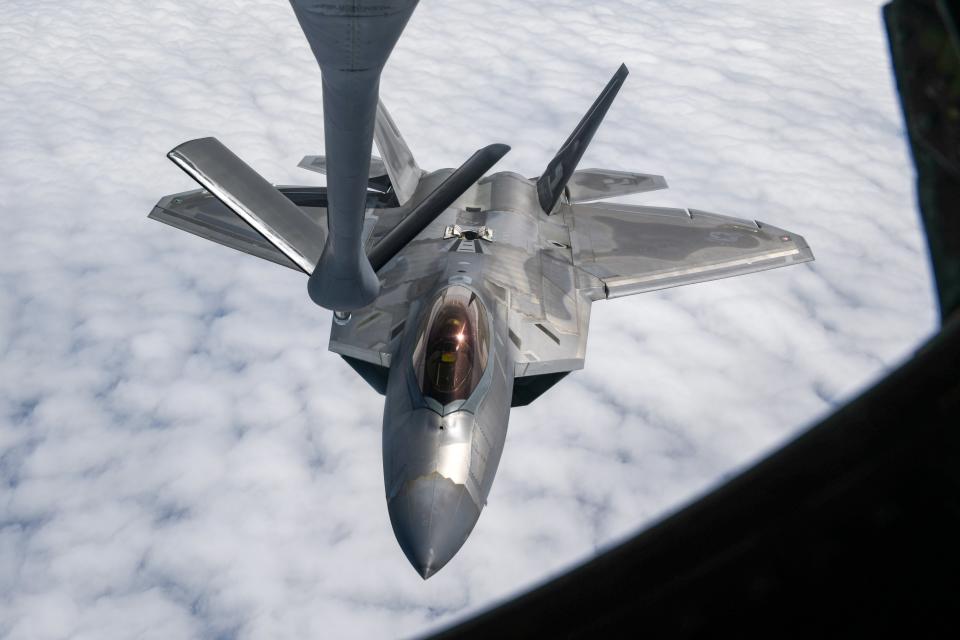 A U.S. Air Force F-22A Raptor assigned to the 27th Fighter Squadron prepares to receive fuel from a 909th Air Refueling Squadron KC-135 Stratotanker during exercise Southern Beach over the Pacific Ocean, May 15, 2024.
