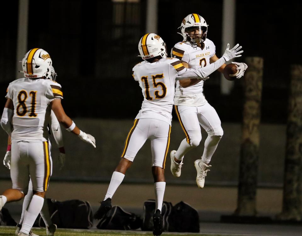 Golden West's Isaac Elias celebrates their first touchdown against Mt. Whitney during their high school football game at Mineral King Bowl in Visalia, Calif., Friday, Oct. 6, 2023.