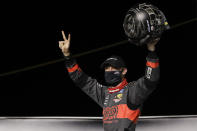 Austin Cindric (22) celebrates after winning a NASCAR Xfinity Series auto race Friday, July 10, 2020, in Sparta, Ky. (AP Photo/Mark Humphrey)