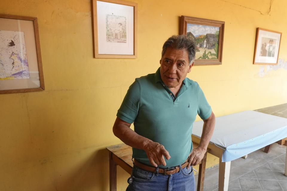 Ramón Gálvez, cousin of presidential candidate Xóchitl Gálvez, speaks during an interview inside her childhood home in Tepatepec, Mexico, Friday, May 10, 2024. Xóchitl Gálvez, 61, rebelled and left the town at 16 to study computer engineering in Mexico City and while Gálvez’s father Heladio had a job as a teacher, the family of seven struggled financially because he spent all his money on alcohol before dying of a terminal illness in 2003, said her cousin, Ramón Gálvez. (AP Photo/Fernando Llano)