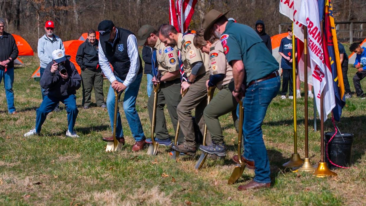 BSA Scout leaders break ground for a new outdoor meeting area at Christ Community Church in Williamson County.