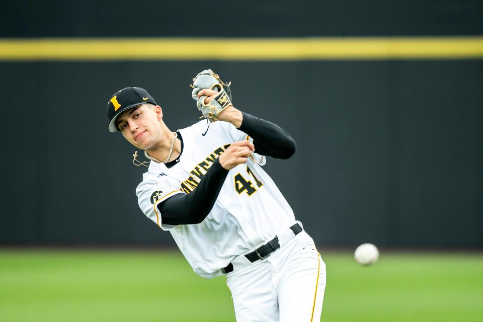 Iowa’s Chas Wheatley warms up before a NCAA Big Ten Conference baseball game against Ohio State, Friday, May 5, 2023, at Duane Banks Field in Iowa City, Iowa.